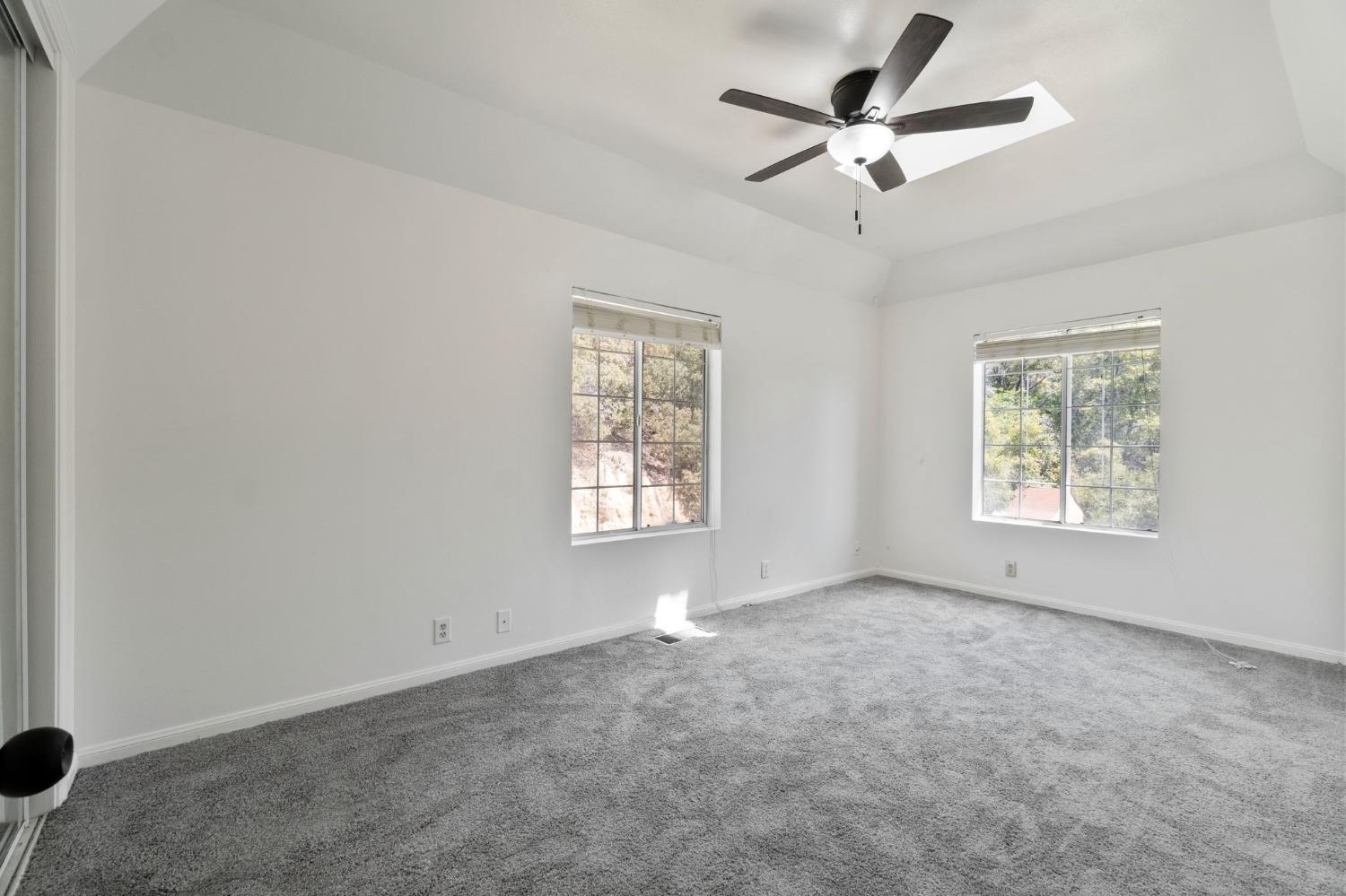 2832 East Westfall Road Mariposa, CA 95338 - Photo 13 of 38 a view of an empty room with a window