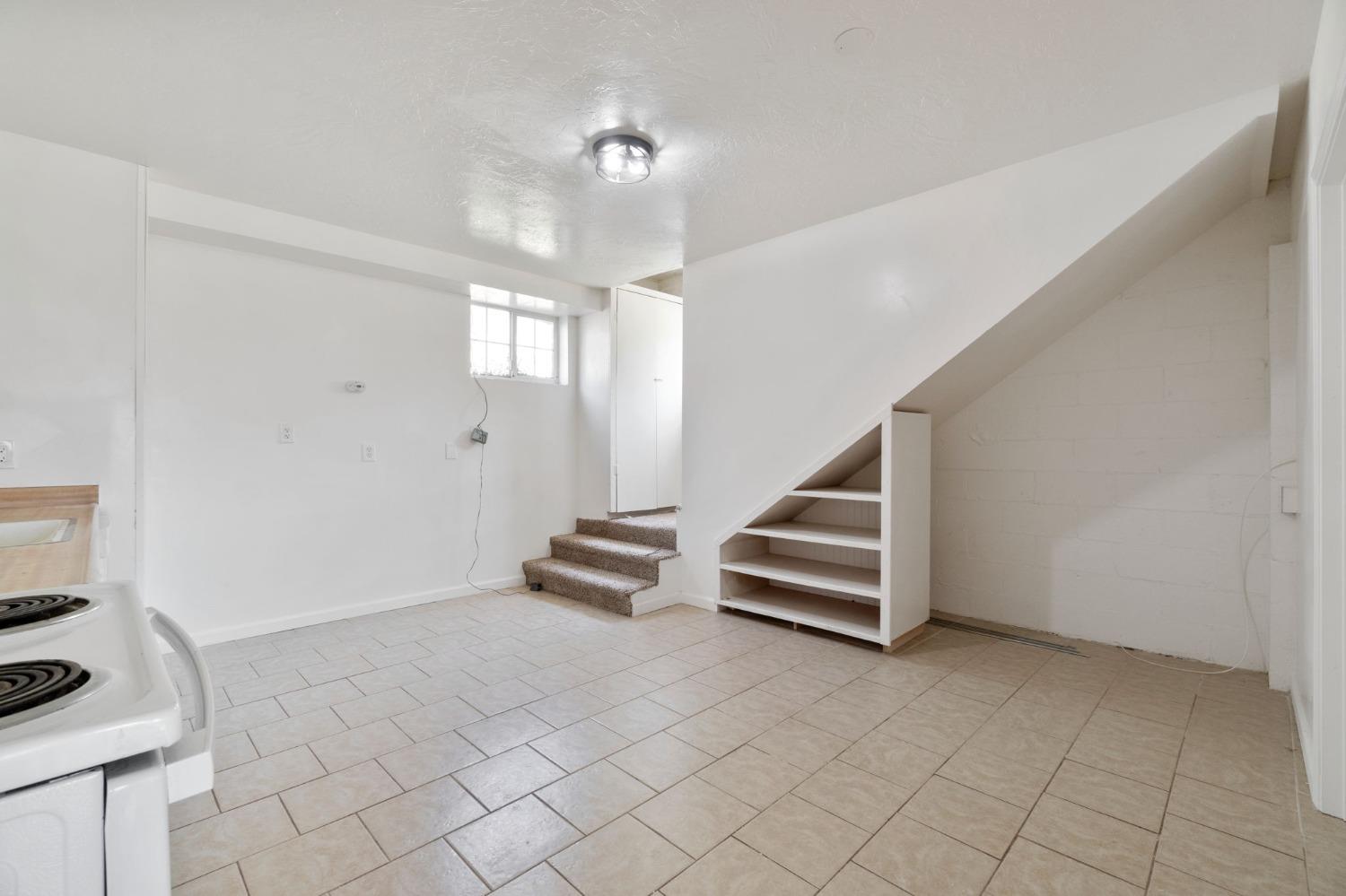 2832 East Westfall Road Mariposa, CA 95338 - Photo 22 of 38 a view of an empty room with stairs
