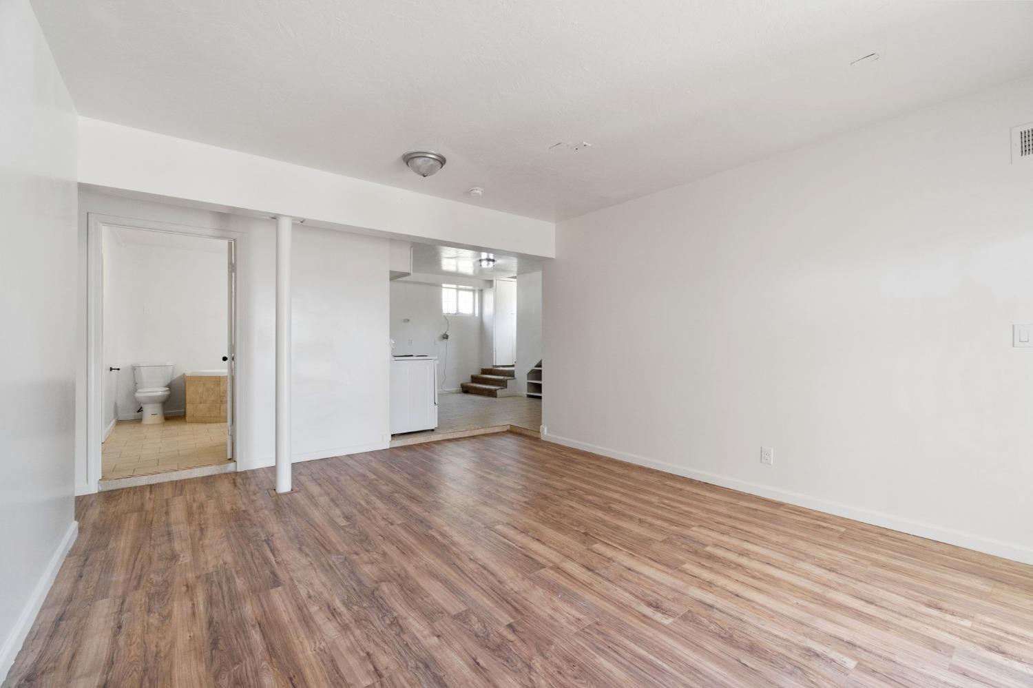 2832 East Westfall Road Mariposa, CA 95338 - Photo 26 of 38 a view of a room with wooden floor