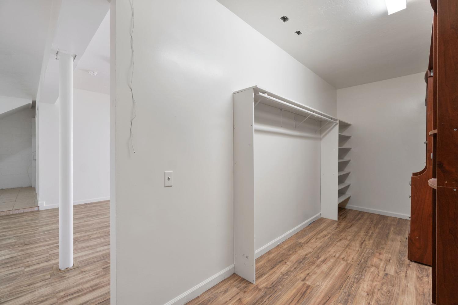 2832 East Westfall Road Mariposa, CA 95338 - Photo 27 of 38 a view of a room with wooden floor