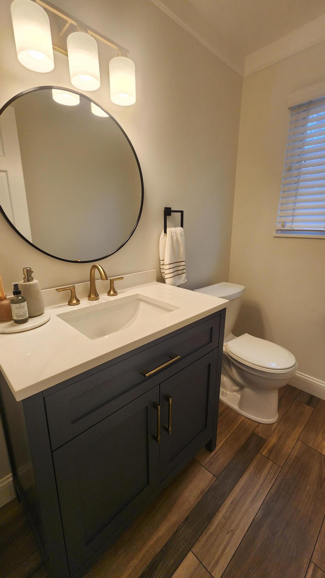 5145 Greer Road West Bloomfield, MI 48324 - Photo 8 of 24 Main floor powder room