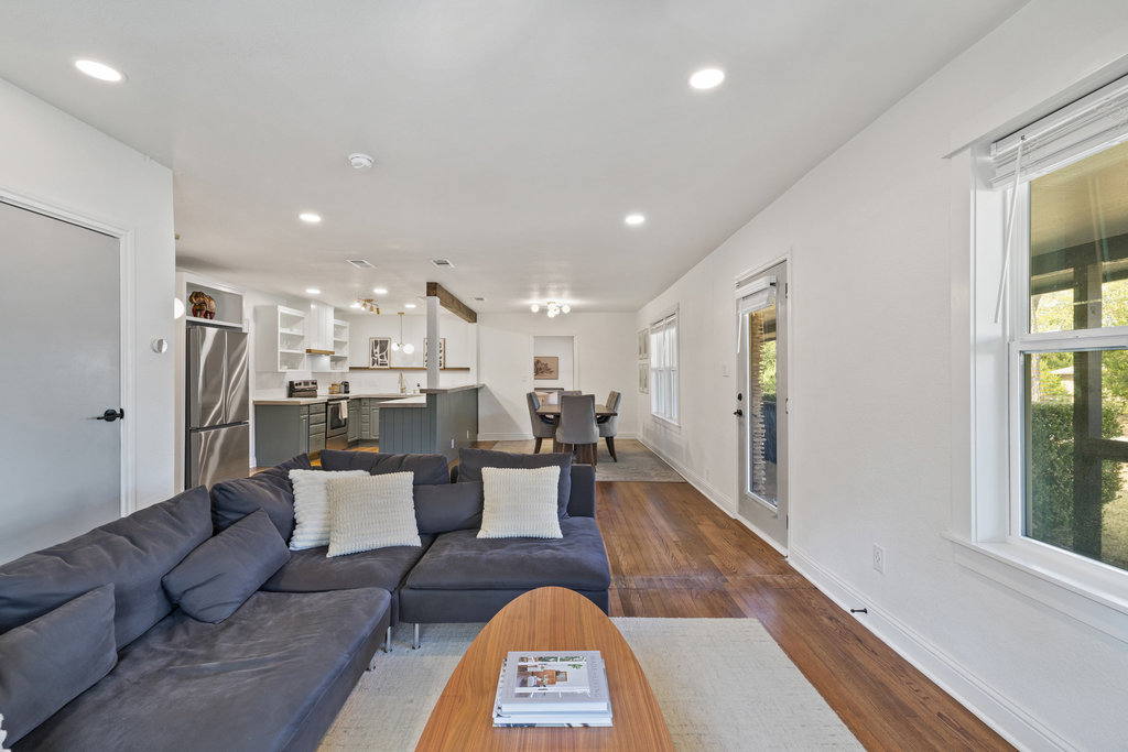 7511 Old Bee Cave Road, Unit 2 Austin, TX 78735 - Photo 13 of 39 a living room with furniture and a wooden floor