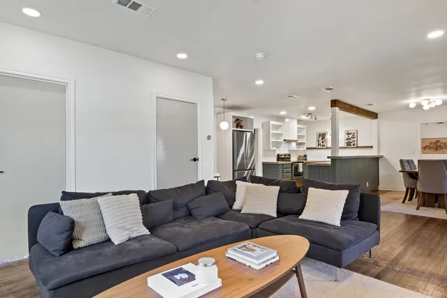 a living room with furniture and a couch