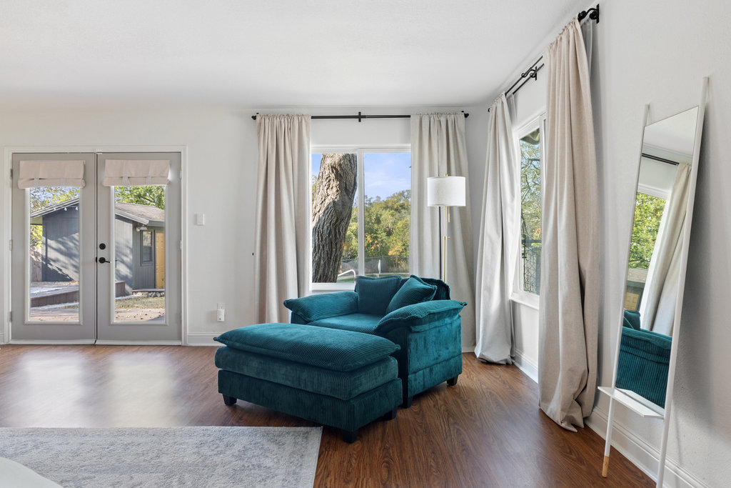 7511 Old Bee Cave Road, Unit 2 Austin, TX 78735 - Photo 20 of 39 a living room with furniture and a window