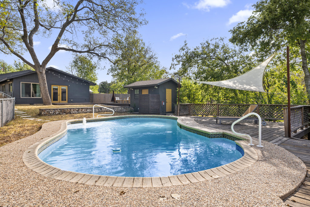 7511 Old Bee Cave Road, Unit 2 Austin, TX 78735 - Photo 28 of 39 a view of a house with swimming pool
