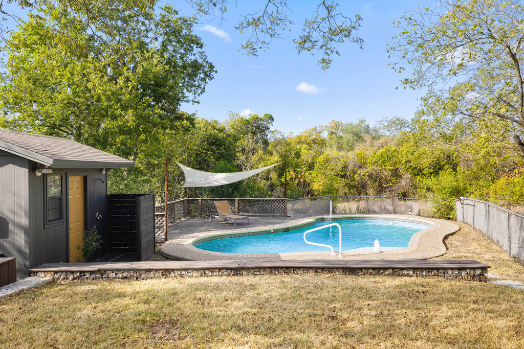 7511 Old Bee Cave Road, Unit 2 Austin, TX 78735 - Photo 29 of 39 a view of a house with a backyard
