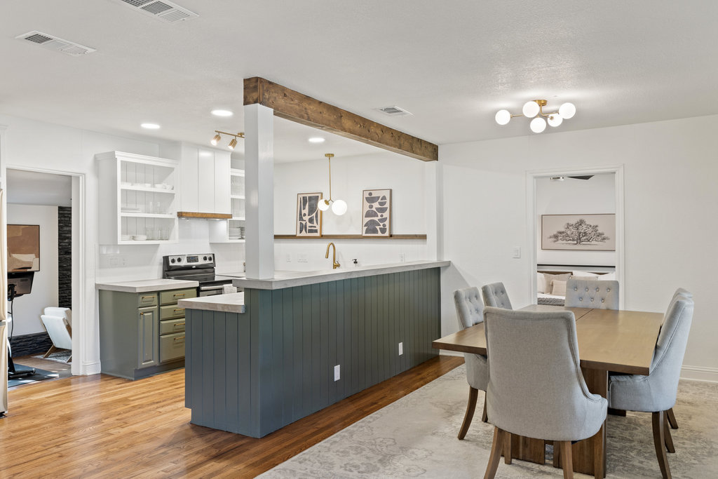 7511 Old Bee Cave Road, Unit 2 Austin, TX 78735 - Photo 9 of 39 a view of a dining room with furniture and wooden floor