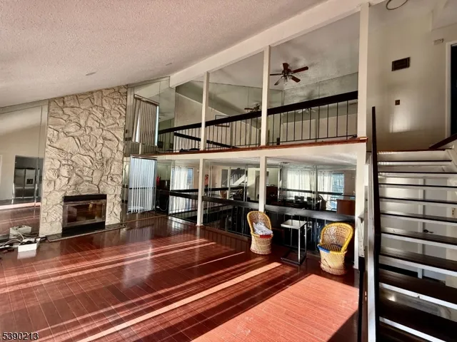 a bathroom with a sink toilet and a mirror