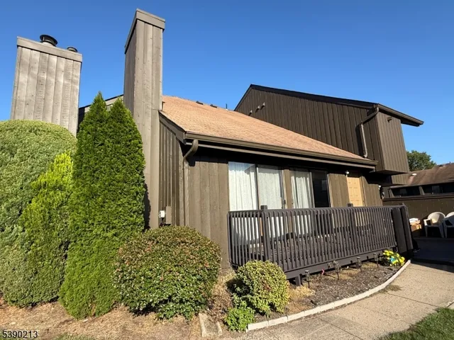 a backyard of a house with a small yard