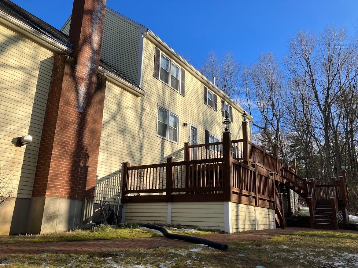 23 Cedar Farms Road Medway, MA 02053 - Photo 38 of 42 back tiered deck yellow