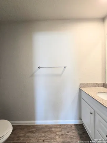 a kitchen with stainless steel appliances granite countertop a stove top oven a sink a counter top space and cabinets