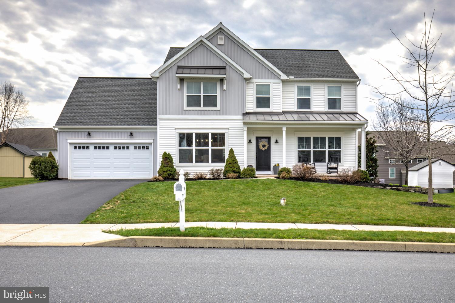 73 Summers Drive Stevens, PA 17578 - Photo 1 of 42 a front view of a house with a yard