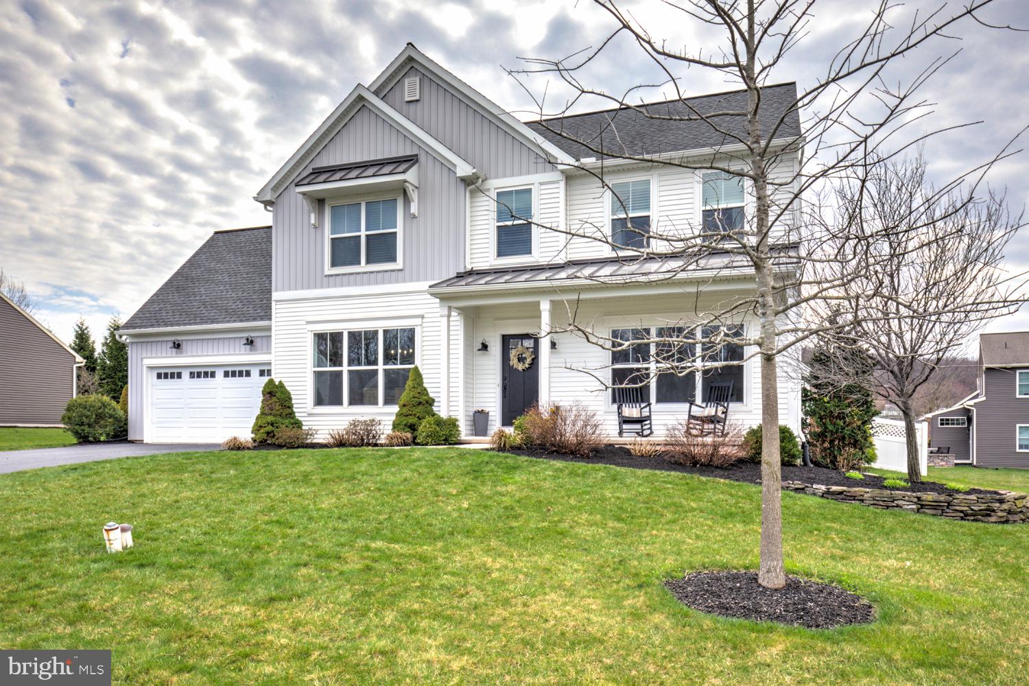 73 Summers Drive Stevens, PA 17578 - Photo 9 of 42 a front view of a house with a yard and trees