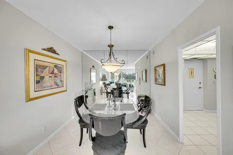 a kitchen with stainless steel appliances a refrigerator sink and stove