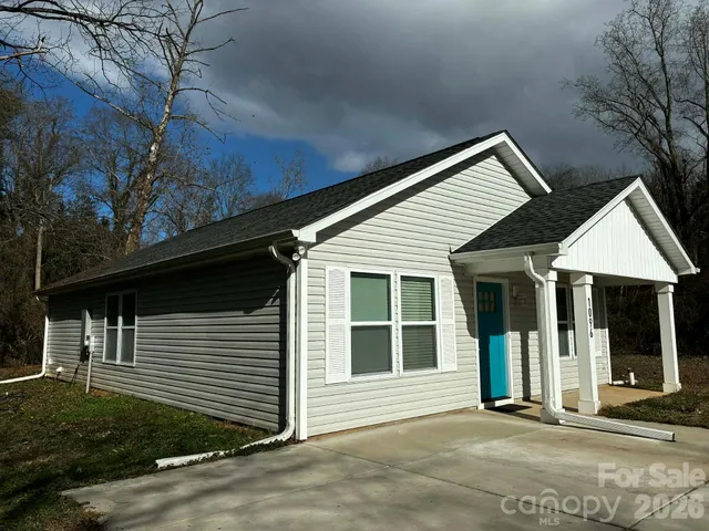 a front view of a house with a garage