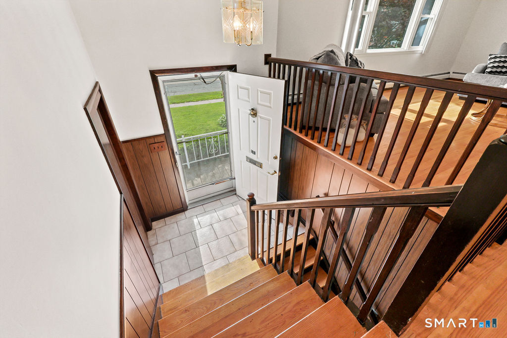142 Wolcott Hill Road Wethersfield, CT 06109 - Photo 3 of 29 a view of an entryway with staircase