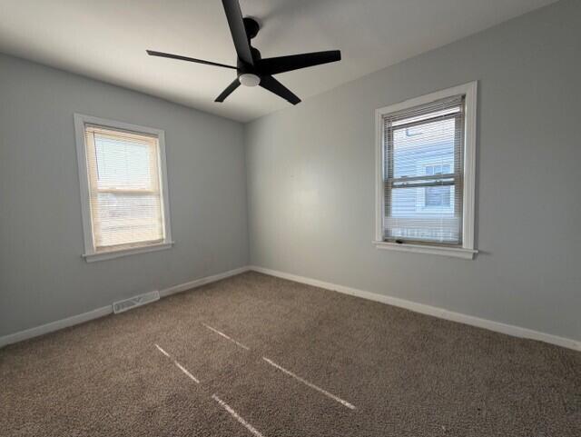 3134 Cleveland Street Hammond, IN 46323 - Photo 5 of 15 a view of an empty room with a window