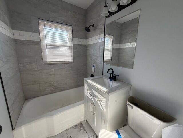 3134 Cleveland Street Hammond, IN 46323 - Photo 6 of 15 a bathroom with a sink a toilet and shower
