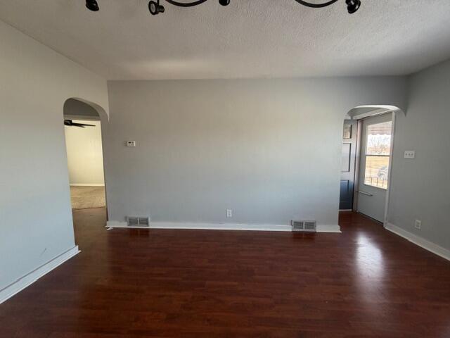 3134 Cleveland Street Hammond, IN 46323 - Photo 7 of 15 an empty room with wooden floor and windows