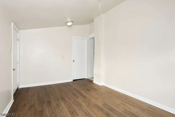 a view of small space with wooden floor