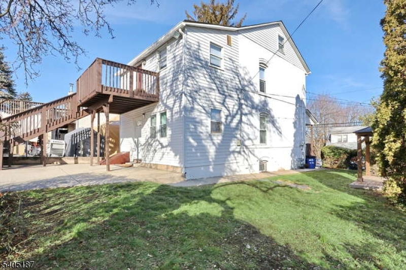 68 Mohawk Avenue Hawthorne, NJ 07506 - Photo 22 of 24 a view of a house with a yard
