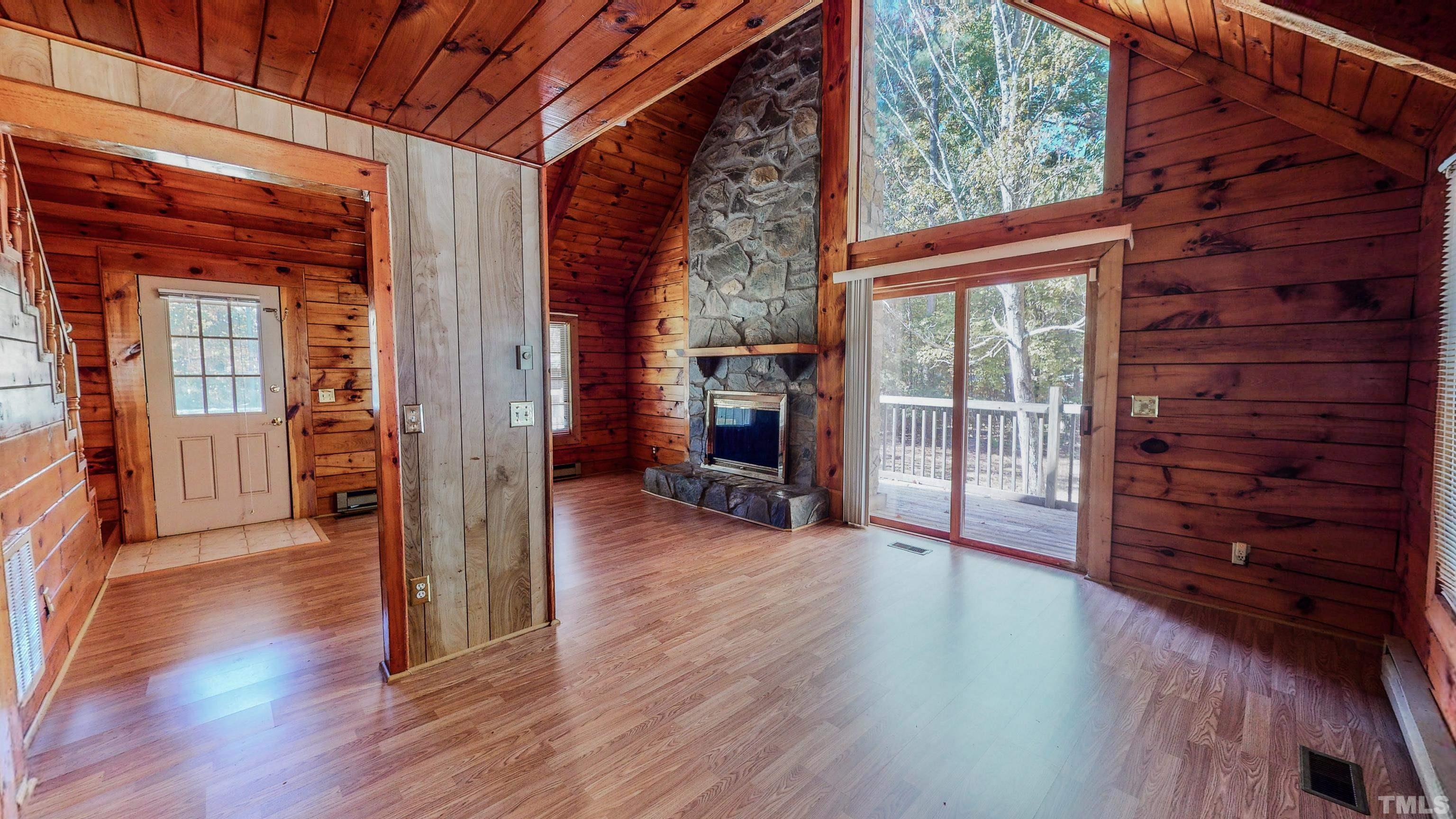 412 Shiloh Church Road Roxboro, NC 27574 - Photo 2 of 30 a view of a hallway with wooden floor and windows
