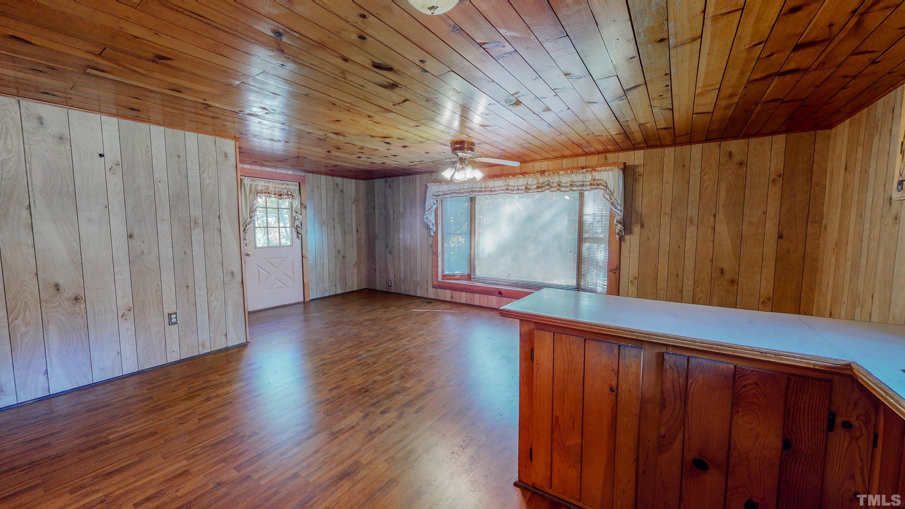 412 Shiloh Church Road Roxboro, NC 27574 - Photo 15 of 30 a view of livingroom with hardwood floor and a ceiling fan