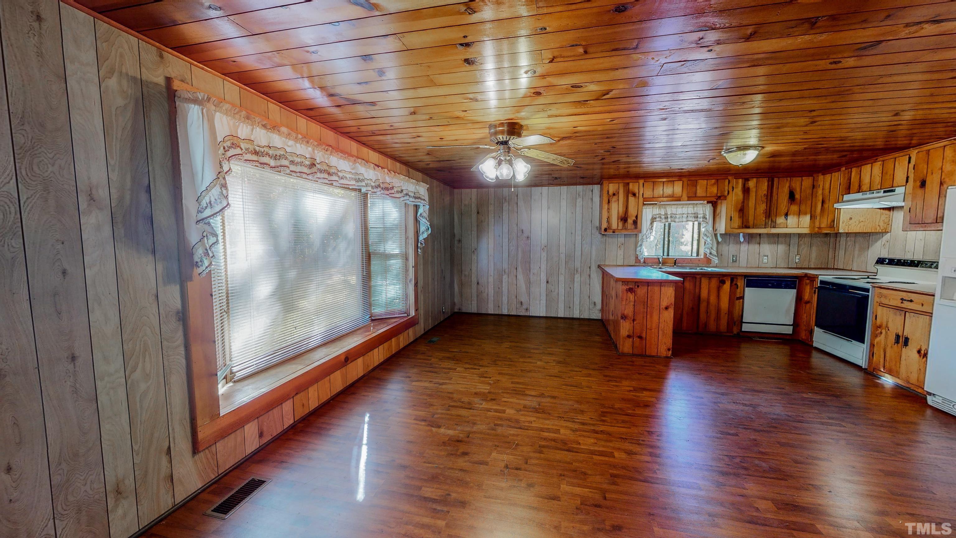 412 Shiloh Church Road Roxboro, NC 27574 - Photo 17 of 30 a view of a room with wooden floors