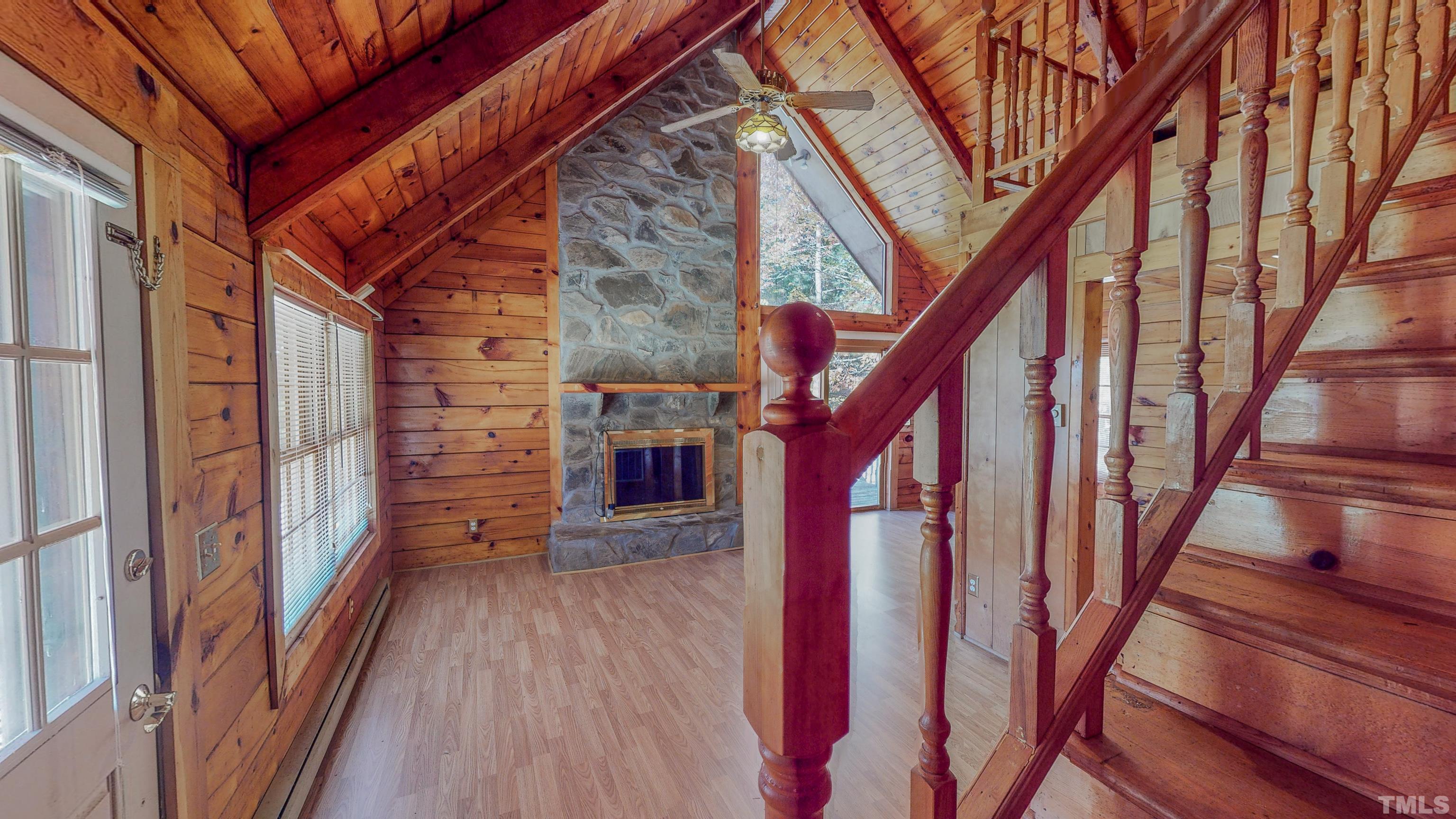 412 Shiloh Church Road Roxboro, NC 27574 - Photo 19 of 30 a view of an entryway with wooden floor and stairs