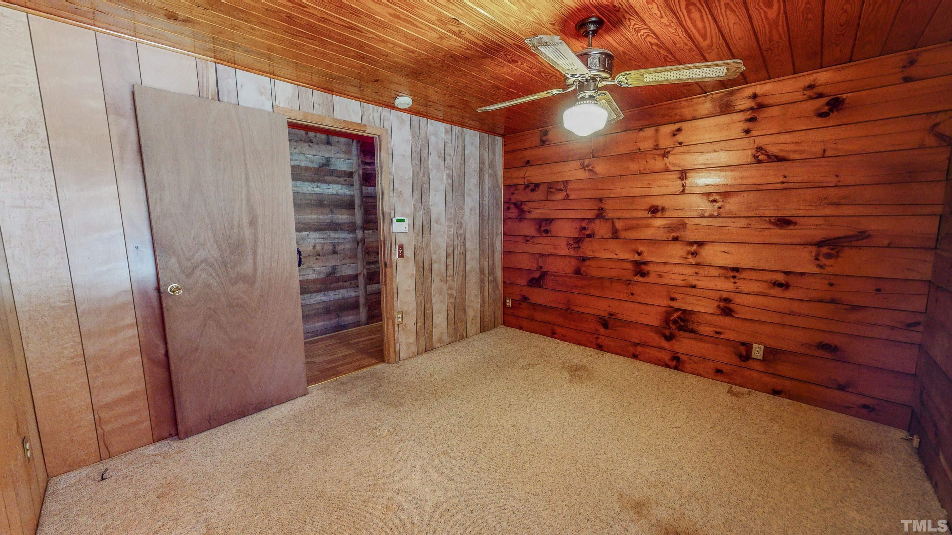 412 Shiloh Church Road Roxboro, NC 27574 - Photo 25 of 30 a view of empty room with wooden floor