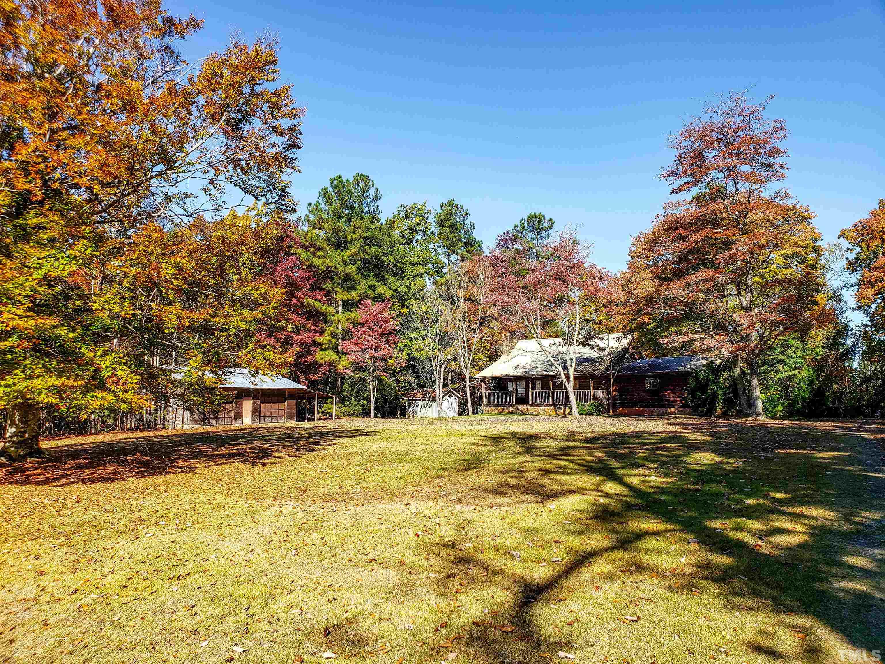 412 Shiloh Church Road Roxboro, NC 27574 - Photo 30 of 30 a swimming pool with outdoor seating and yard