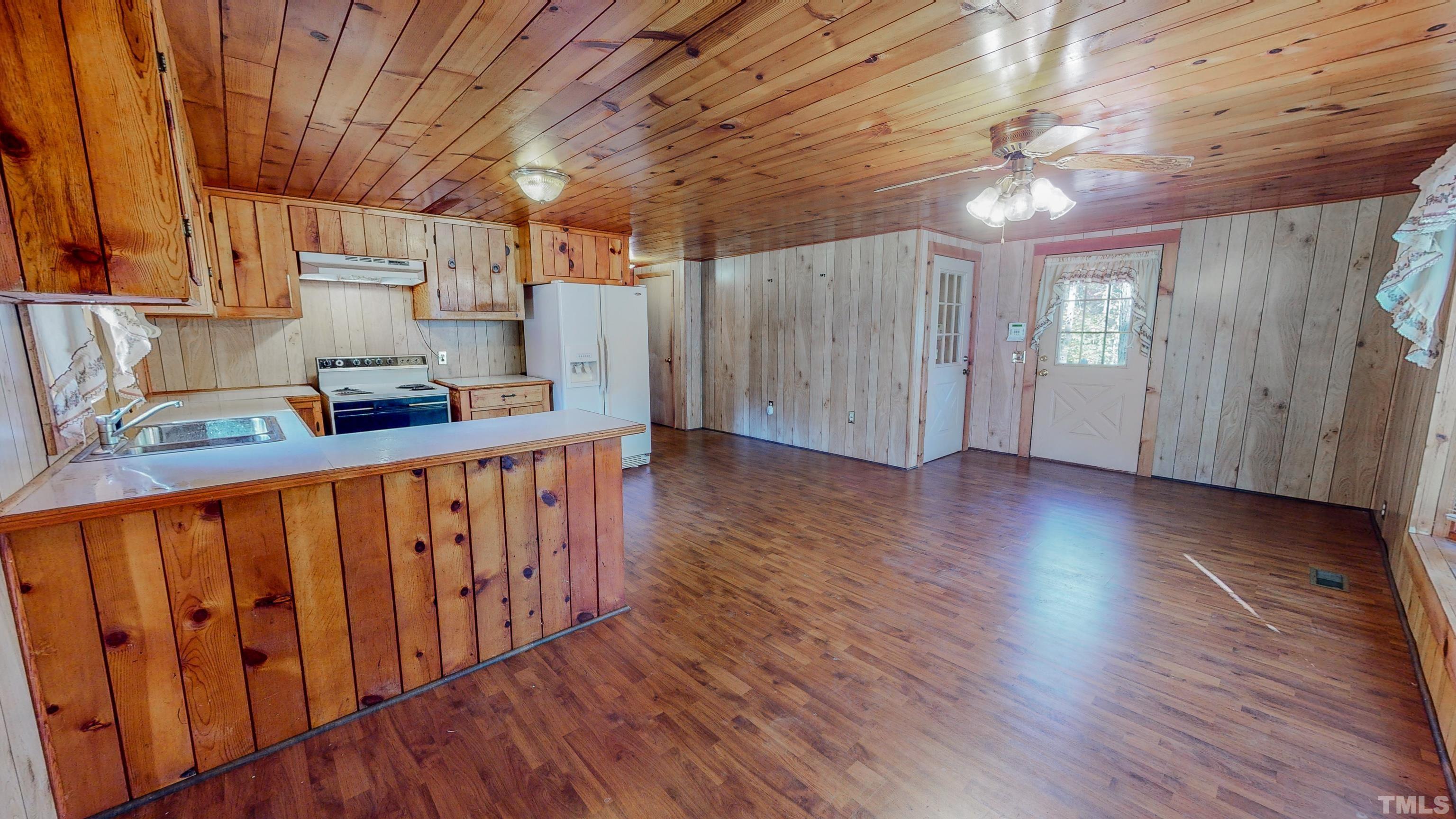412 Shiloh Church Road Roxboro, NC 27574 - Photo 7 of 30 a view of hallway with wooden floor