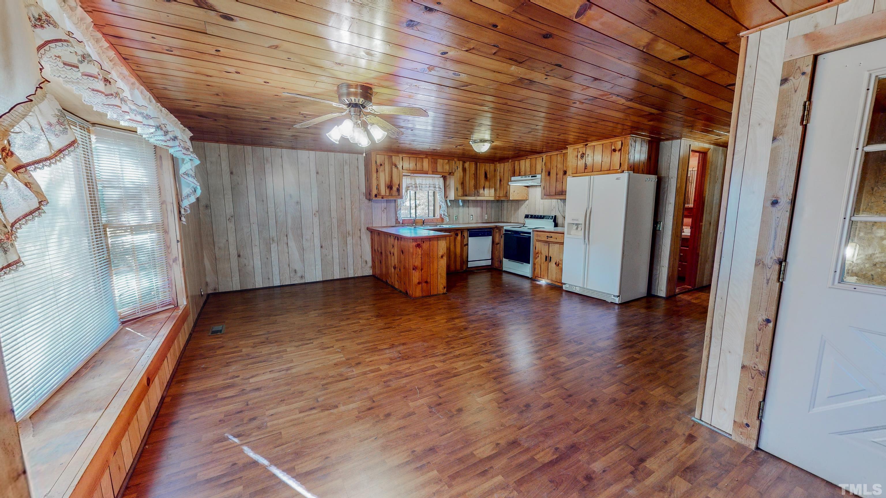 412 Shiloh Church Road Roxboro, NC 27574 - Photo 8 of 30 a view of a room with wooden floor