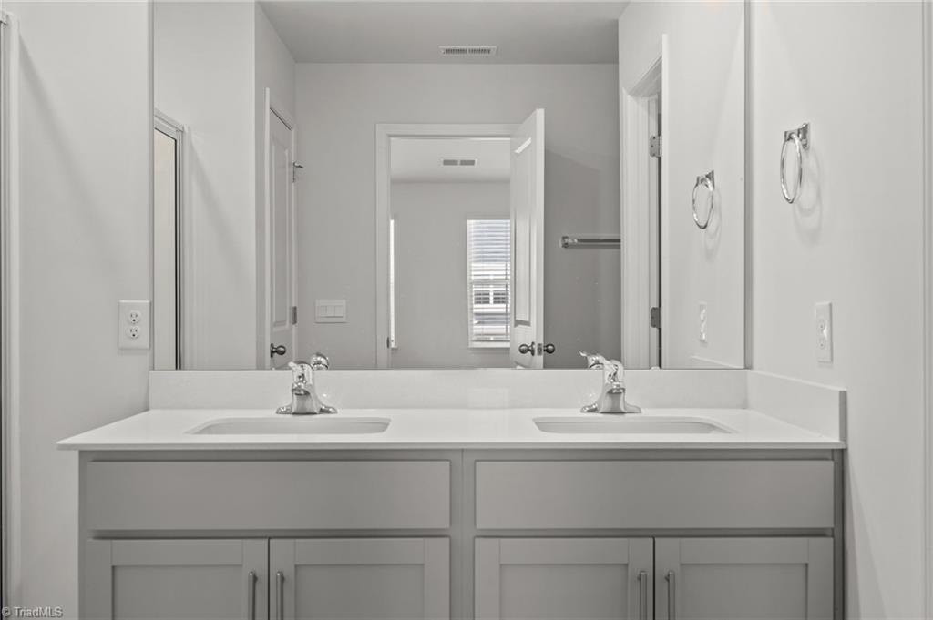 4604 Heatherly Road Winston-Salem, NC 27105 - Photo 15 of 31 Dual sinks in Primary En-suite bath