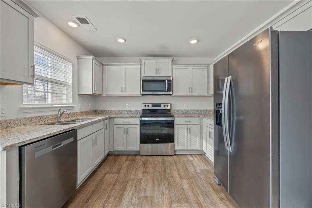 4604 Heatherly Road Winston-Salem, NC 27105 - Photo 8 of 32 SS appliances