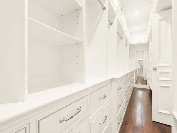 a bathroom with a sink a mirror and a shower