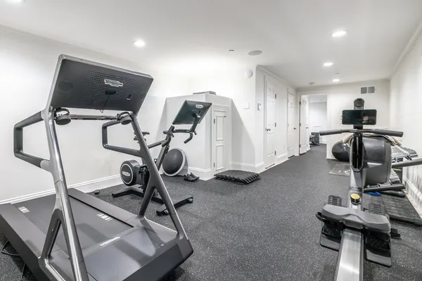 a front view of a house with stairs