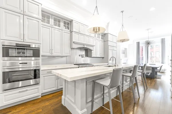 a view of a kitchen with kitchen and sink