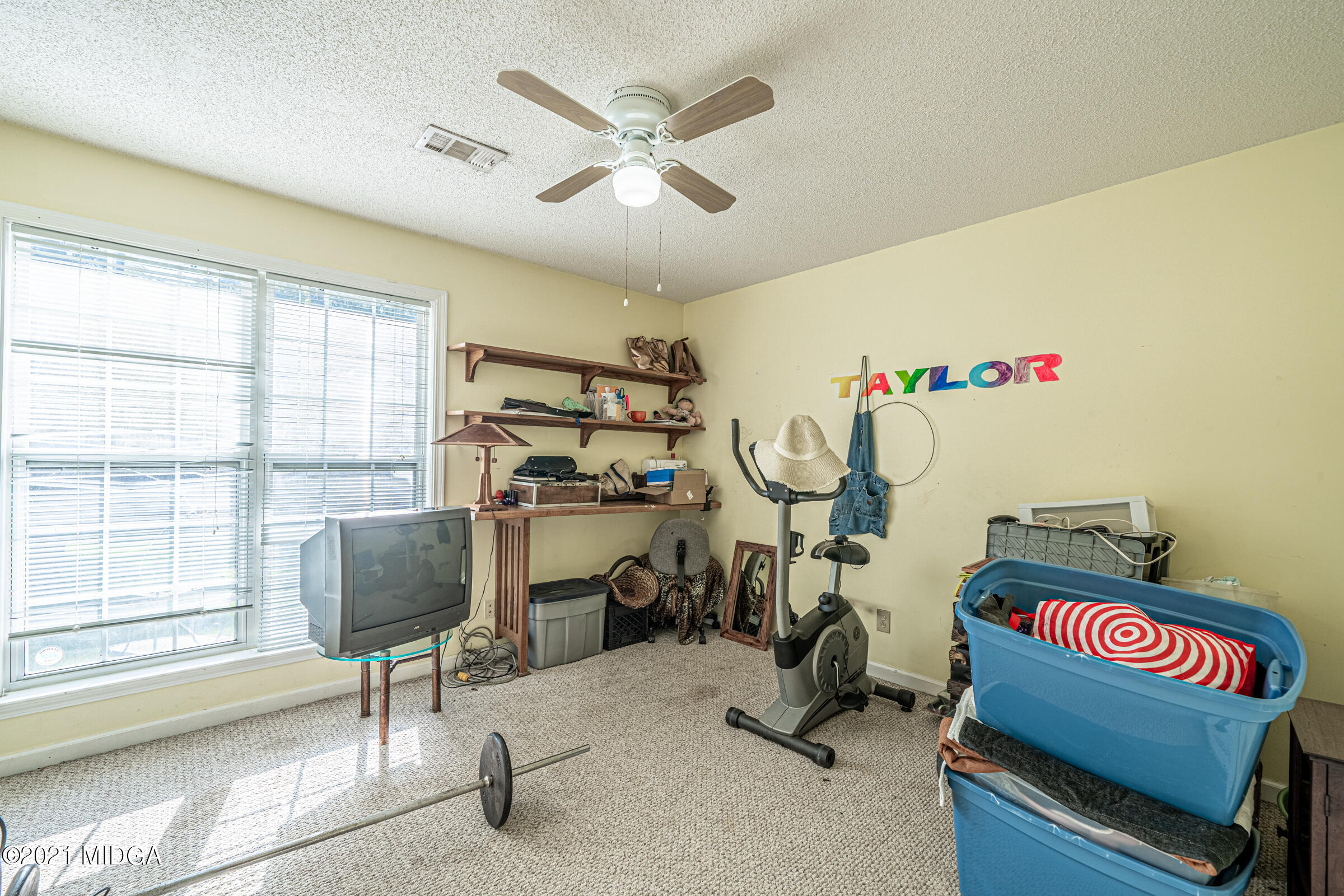 239 Plantation Road Gray, GA 31032 - Photo 18 of 28 a view of a room with gym equipment