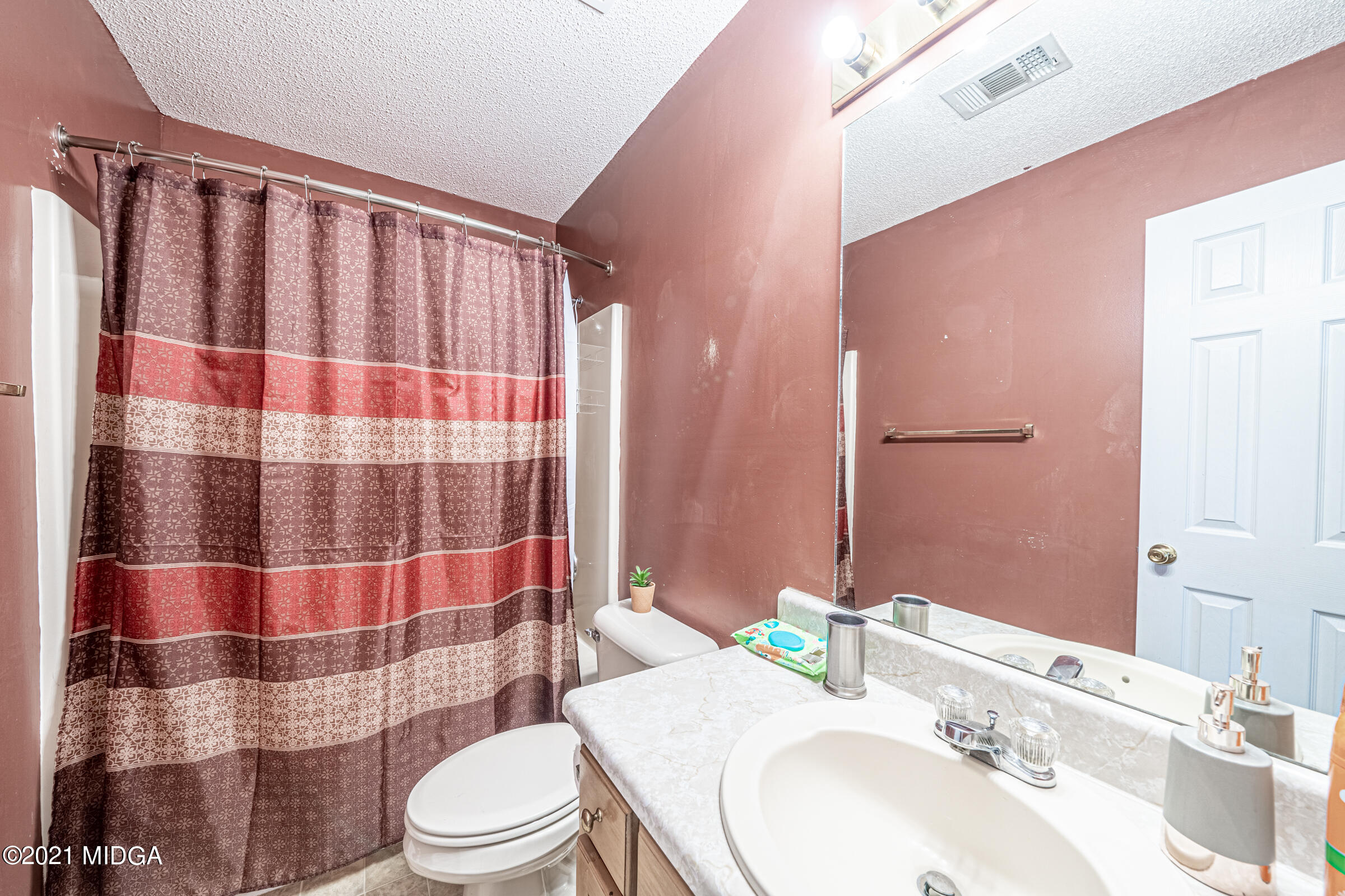 239 Plantation Road Gray, GA 31032 - Photo 21 of 28 a bathroom with a sink toilet and shower