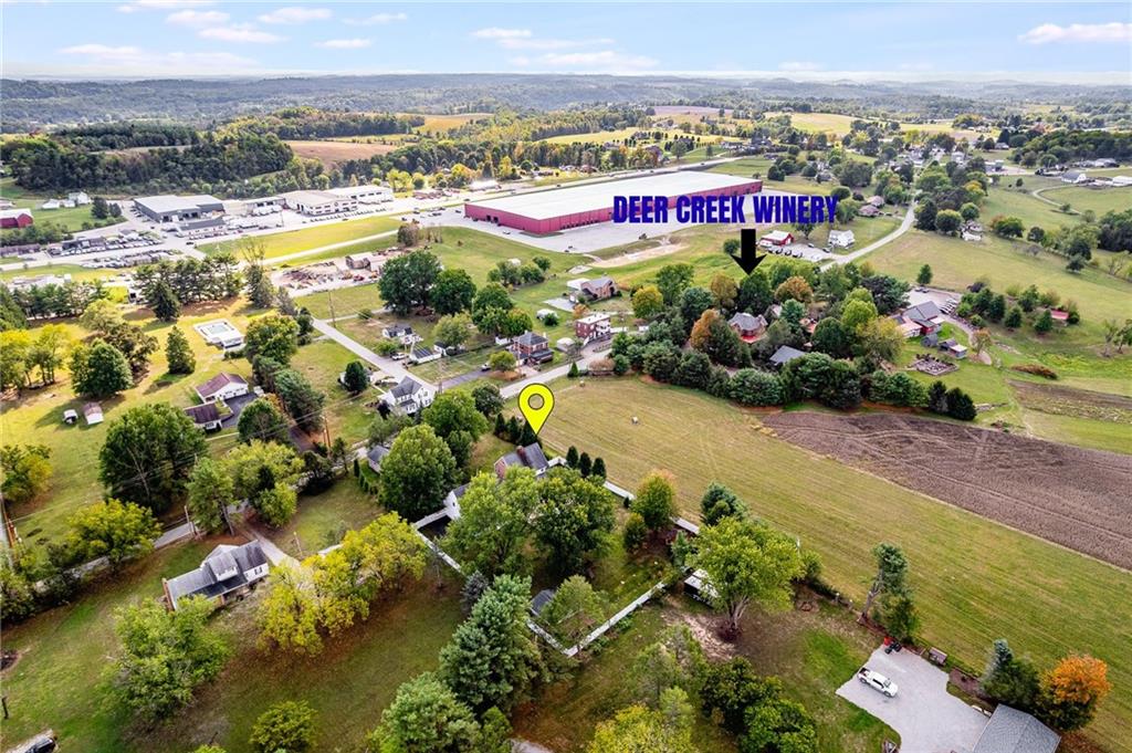 200 Balsinger Road Uniontown, PA 15401 - Photo 22 of 50 an aerial view of residential houses with outdoor space and swimming pool