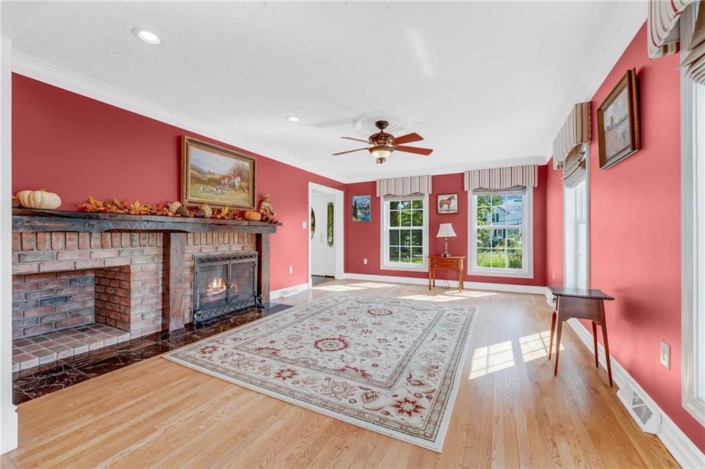 200 Balsinger Road Uniontown, PA 15401 - Photo 36 of 50 a view of an empty room with a fireplace and a window