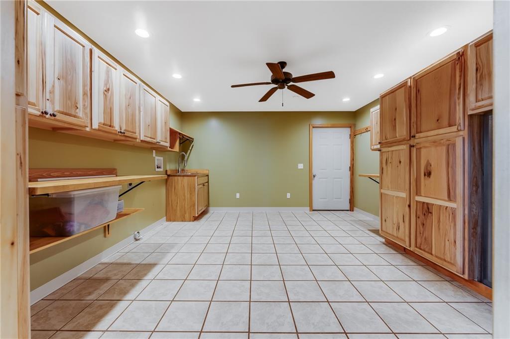 200 Balsinger Road Uniontown, PA 15401 - Photo 47 of 50 a view of a livingroom with an empty space wooden floor and staircase