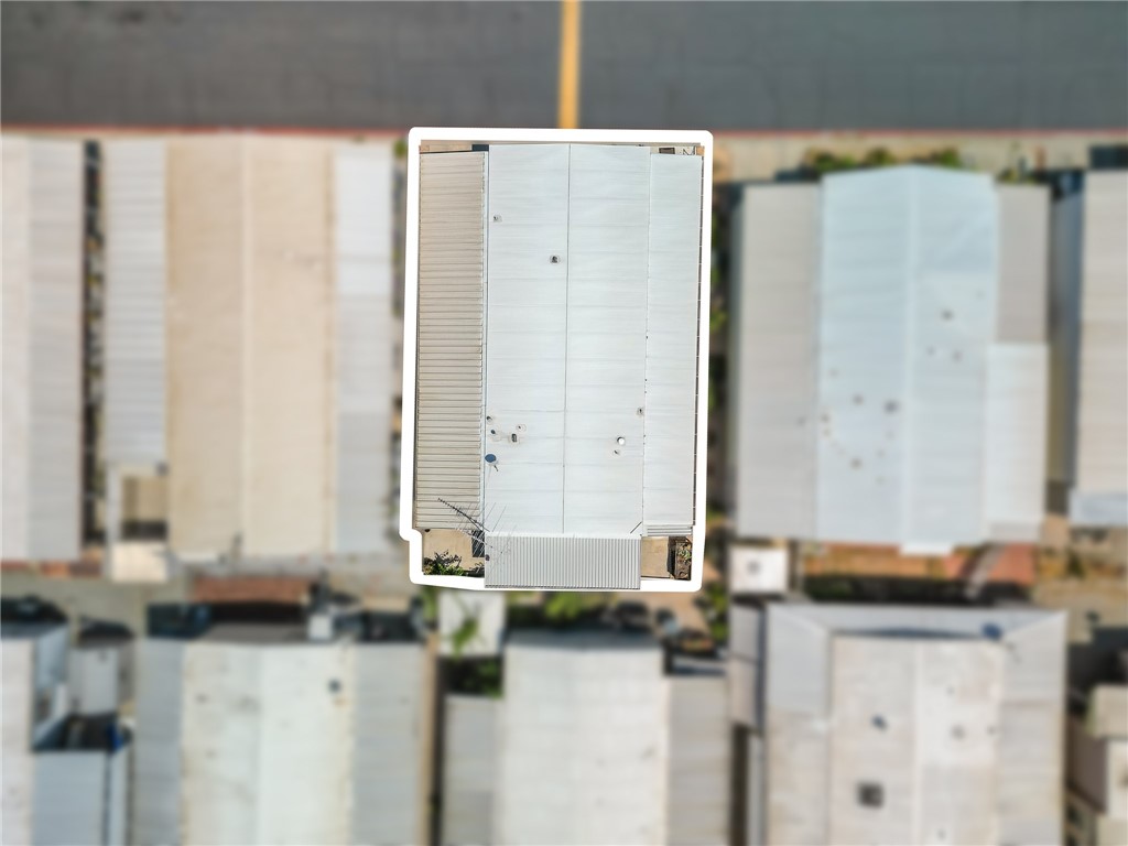 975 California Street, Unit 49 Calimesa, CA 92320 - Photo 23 of 31 a bathroom with a granite countertop sink and a mirror