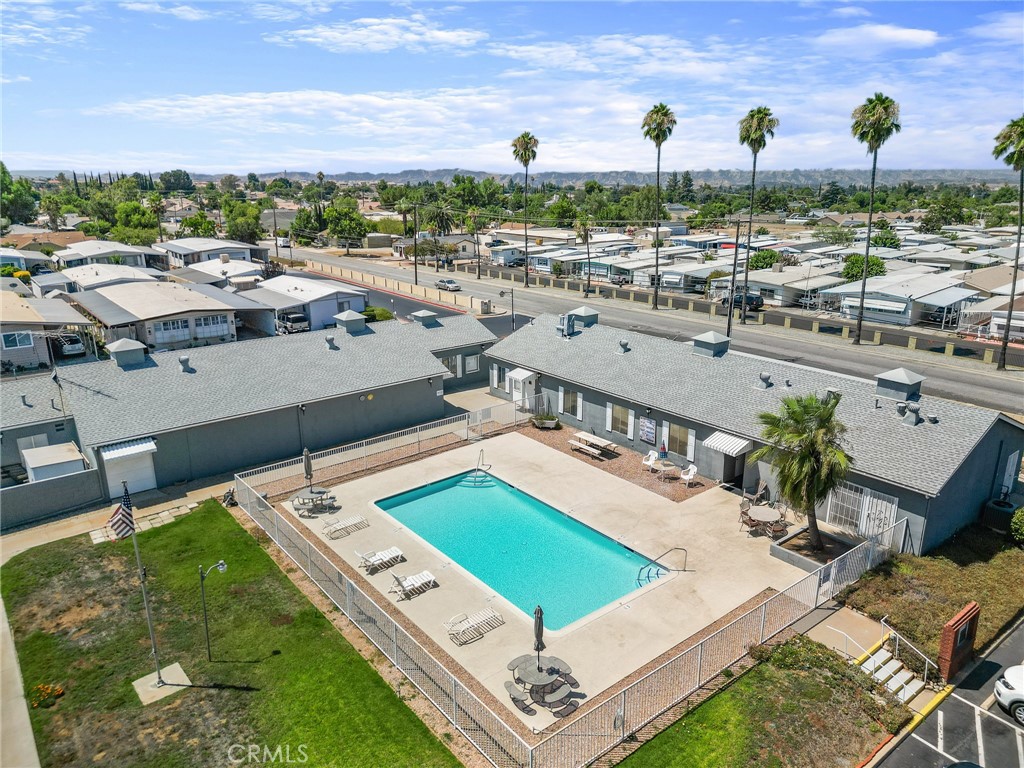 975 California Street, Unit 49 Calimesa, CA 92320 - Photo 25 of 31 a terrace with outdoor seating and city view