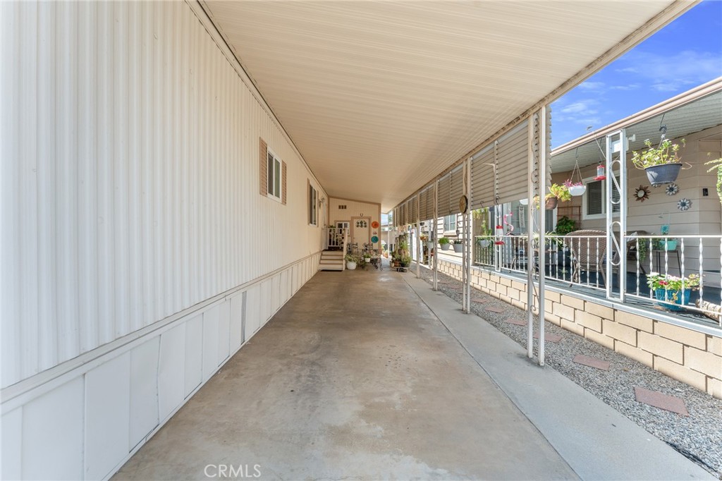 975 California Street, Unit 49 Calimesa, CA 92320 - Photo 27 of 31 a view of a porch