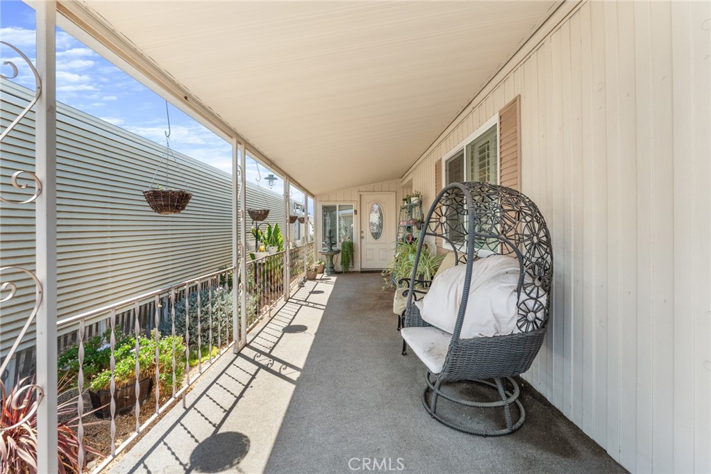 975 California Street, Unit 49 Calimesa, CA 92320 - Photo 28 of 31 a view of entryway with wooden floor