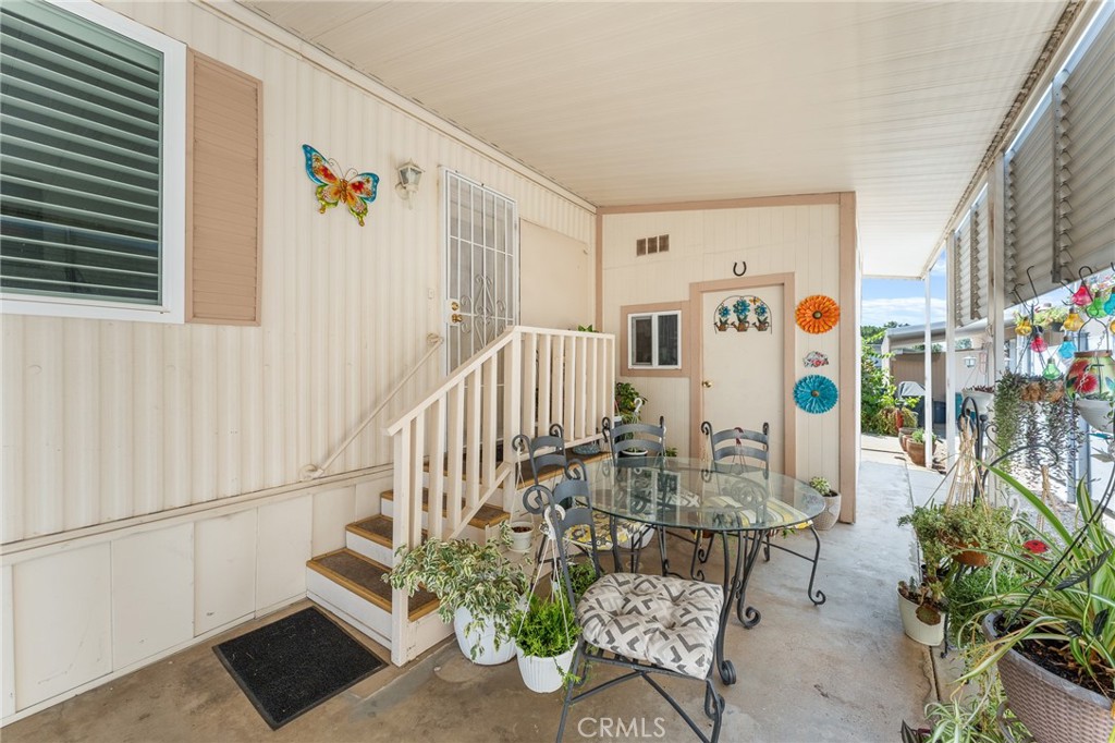 975 California Street, Unit 49 Calimesa, CA 92320 - Photo 29 of 31 a view of entryway with stairs and furniture