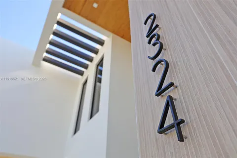 a view of staircase with white walls