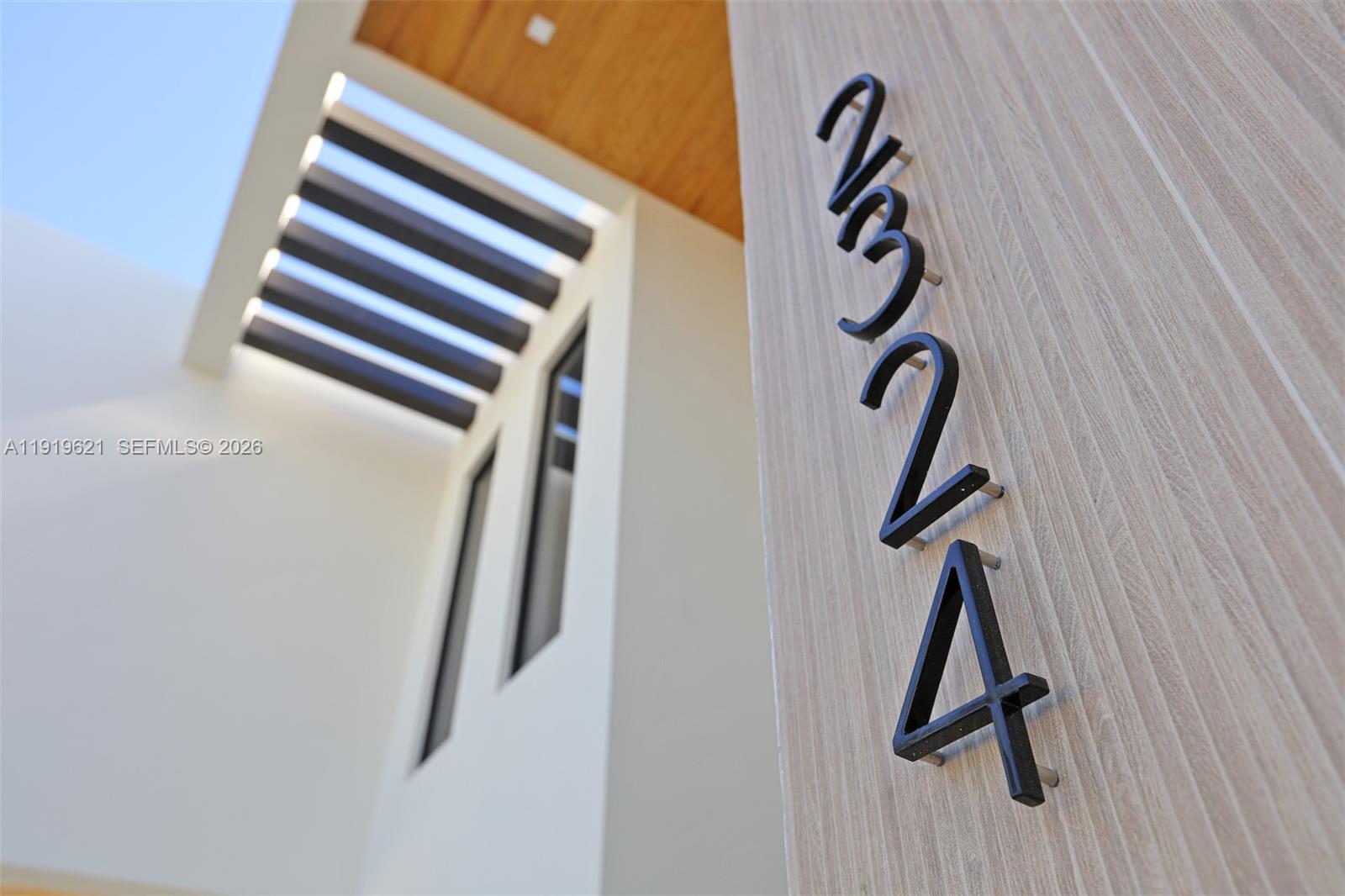 2324 Southwest 26th Street Miami, FL 33133 - Photo 2 of 14 a view of staircase with white walls